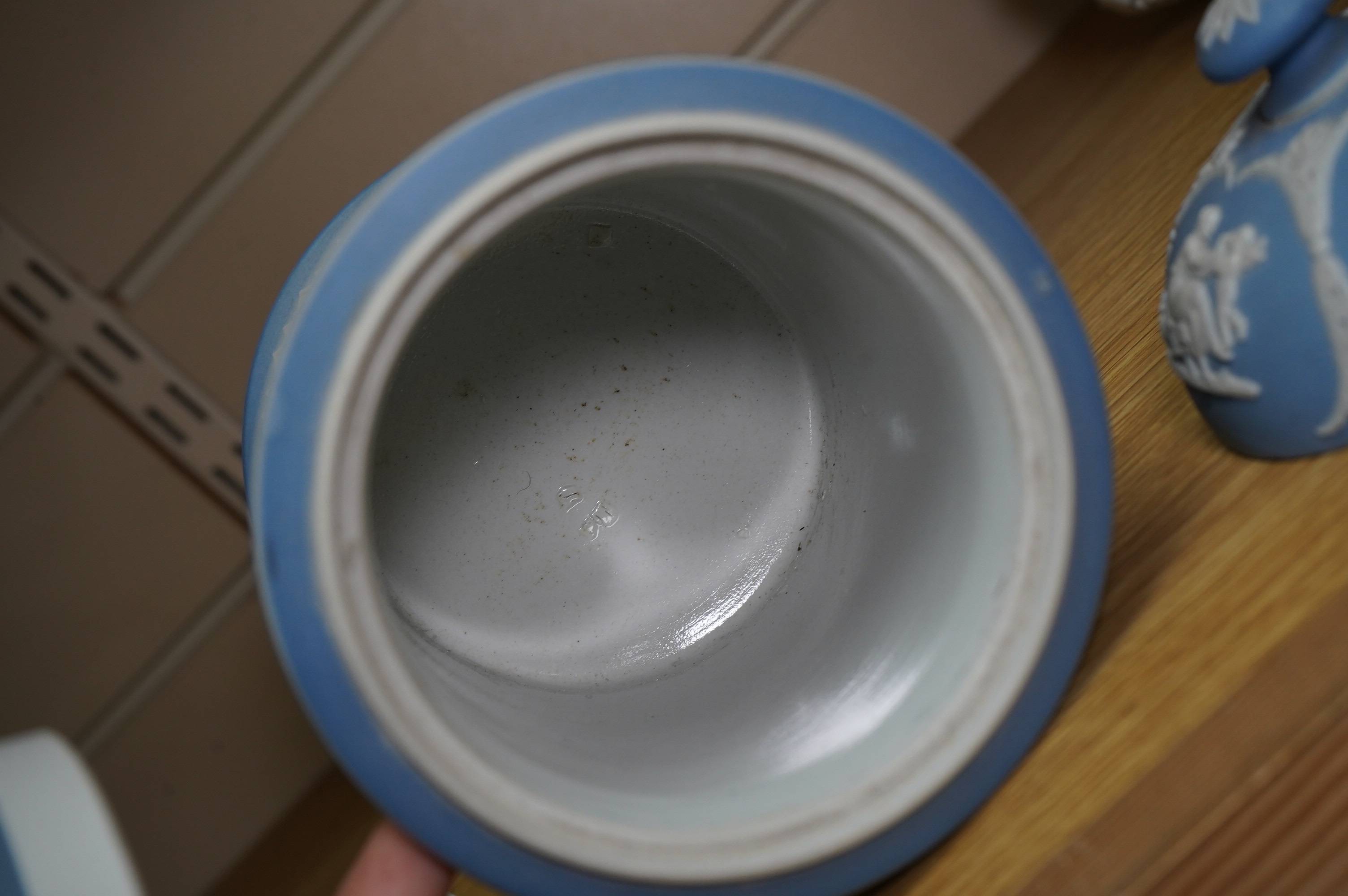 A Wedgwood jasperware tobacco jar, 17cm high. Condition - poor
